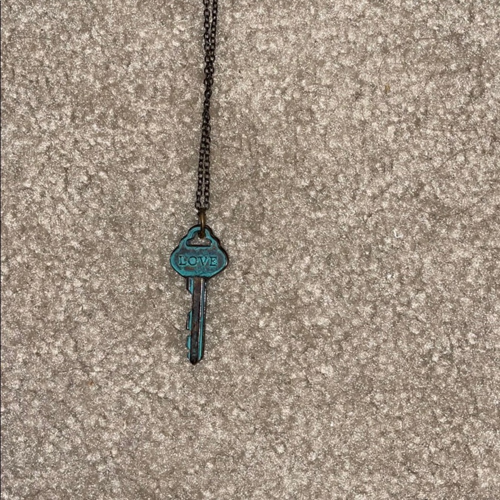 Key necklace with “love” engraved